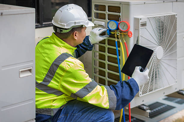 Professional Hvac technician working in Vinemont, AL